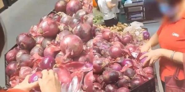 大妈超市买洋葱挨个剥皮减重 这是咋情况？