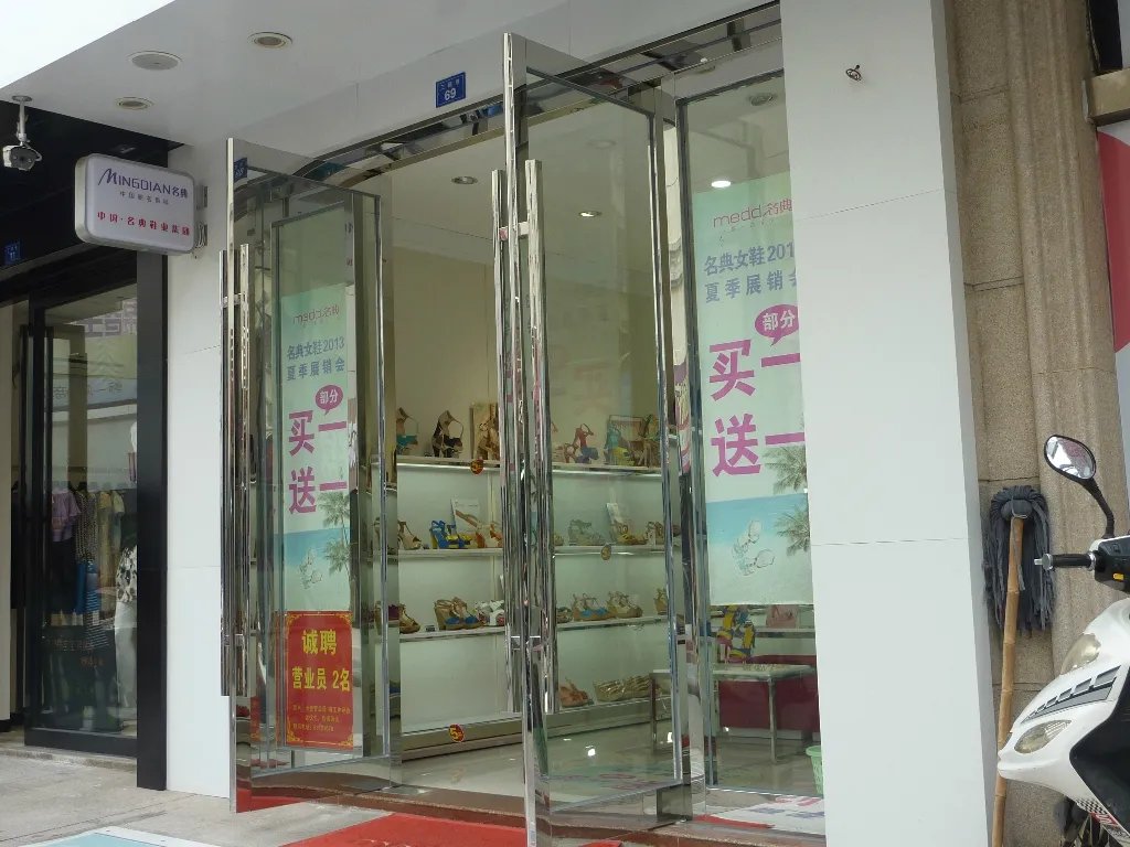 玻璃门地弹簧怎样更换